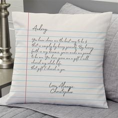 a pillow that has writing on it