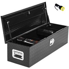 an open tool box with tools in it on a white background and a yellow light