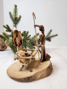 a nativity scene made out of wood and branches