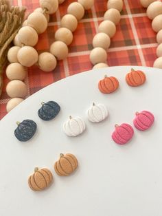 These clay pumpkin stud pack earrings are perfect for fall. These cute textured fall pumpkin small earrings come in 5 colors.  ✨Earring Details✨ - Material: polymer clay - Stainless steel earring posts - Hypoallergenic for sensitive ears - Very lightweight 🎃 Click this link ⬇ to see more of our fall/halloween styles 🎃https://www.etsy.com/shop/Wild4Style?ref=seller-platform-mcnav&section_id=49853113 📦Shipping & Packaging📦 All orders are processed and shipped within 1-7 business days. Earrings Polymer Clay Fall Earrings, Fall Polymer Clay Ideas, Clay Earrings Studs, Clay Pumpkin, Cardboard Shipping Boxes, Clay Stud Earrings, Colored Earrings, Earrings Fall, Poly Clay