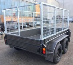 a truck with caged animals in the back