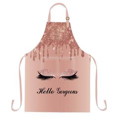 an apron with the words hello gorgeous written on it and eyelashes in front of them