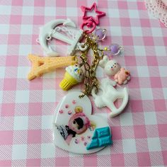 there is a keychain that has various items on it