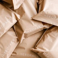 a pile of pillows with the words heropack on them