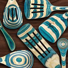 Add a splash of cool color to your kitchen with the Baltique® Mykonos collection 7-piece utensil set. These eye-catching utensils are masterfully crafted from layers of colored birched wood to create a gorgeous color array. The Mykonos collection was inspired by the cooling feel of the Greek island of Mykonos and features a cool blend of light blue and natural wood colors. This gorgeously colored utensil set includes the full collection; a mixing spoon, slotted spoon, spatula, slotted spatu… Slotted Spoon, Slotted Spoons, Popular Kitchens, Kitchen Utensil Set, Kitchen Utensil, Greek Island, Utensil Set, Mykonos, Birch Wood