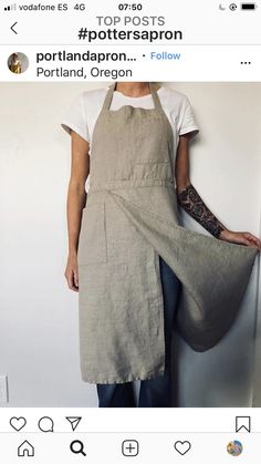 a woman wearing an apron and holding a bag