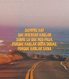 an image of a road with the ocean in the background and words above it that read, sempre hay que intenar hablaar habita sob sob sob sob