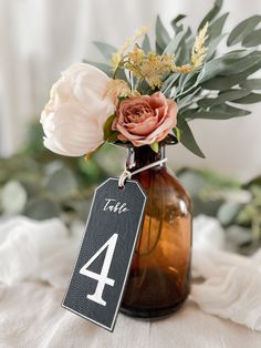 Introducing our Vegan Leather Wedding Table Numbers, a perfect addition to elevate your wedding table decor. Crafted from high-quality vegan leather, these custom wedding table number tags bring a touch of charm and boho elegance to any reception. The supple vegan leather texture mimics the look and feel of genuine leather, while ensuring an eco-friendly choice. Each table number tag is beautifully designed and offered in 7 colors, making them a delightful accent that blends seamlessly with rust Leather Wedding Decor, Wedding Centerpiece Boho, Wheat Wedding, Round Table Decor, Floral Cake Topper, Leather Colors, Wedding Table Number, Leather Wedding, Personalized Napkins