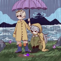 two people standing under an umbrella in the rain