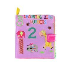 a pink book with numbers and animals on it