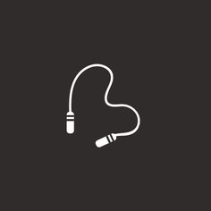 the earphones are plugged in and connected to each other on a black background