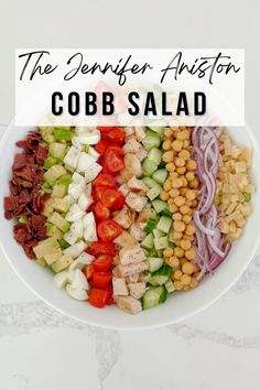 cobb salad in a white bowl with the title text overlay reads, the benefer ashton cobb salad