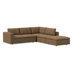 a brown sectional couch sitting on top of a white floor