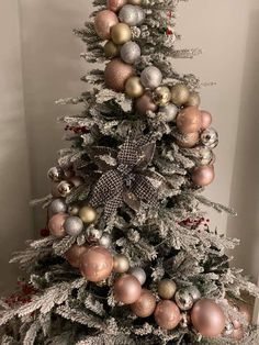 a decorated christmas tree with ornaments on it