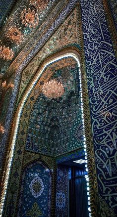 an intricately decorated building with chandeliers and lights