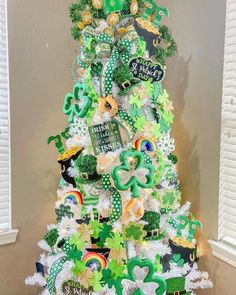 a st patrick's day tree decorated with shamrocks, clovers and lucky charms