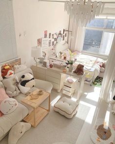 a living room filled with lots of furniture and decor