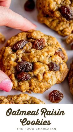 oatmeal raisin cookies with cranberries and pecans in the background