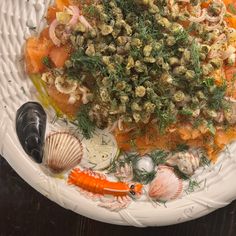 a white plate topped with different types of food