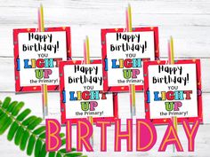 four birthday cards with the words, happy birthday you light up the primary and secondary colors