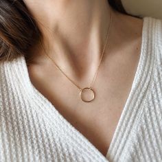 Product Description The Round Wire Ring Necklace is another simplistic necklace. It has a gold filled chain attached to a size a gold ring. This necklace is the perfect minimalist touch for any simple yet elegant souls. Available in 14/20 gold-filled or pure 14k gold metal. What Does 14/20 Gold-Filled Mean? Gold-filled metal is constructed in two or three layers. The core metal is jewelers’ brass, and then the gold is bonded to the surface of the brass core with heat and pressure. Unlike gold pl Simplistic Necklace, Wire Ring, Botanical Jewelry, Wire Rings, Round Rings, Jewelry Cleaner, Pure Gold, Gold Filled Chain, Ring Necklace