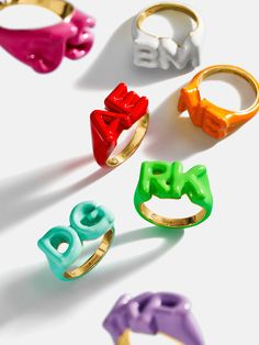 Orders placed between 11/27 - 12/4 will ship between 12/26 - 1/2/25.Create a fun and vibrant staple for your everyday ring stack with the Double Initial Enamel Block Ring. Your initials, or the initials of you and a loved one, will be added onto this ring in a bold, raised-block font. Enpowering Rings, Jlo Rings Jewelry, Bridesmaid Rings Gift, Rolling Stones Ring, Gifts Gen Z, Big Stylish Rings, Funky Jewelry Macy's, Luxury Statement Rings, Fun Gifts For Woman