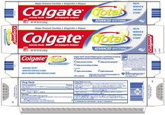 two boxes of colgate toothpaste sitting on top of each other