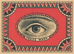 an eye is shown in the middle of a red and black cover with geometric designs