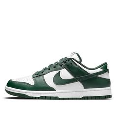 The Nike Dunk Low 'Michigan State' is a classic sneaker that pays homage to its “Be True To Your School” origins. Introduced over three decades ago, the Dunk Low became an icon of expression across popular culture, from skateboarding to modern art. This summer, it returns in a timeless colorway featuring a white leather upper with Varsity Green leather overlays and Swoosh logos. The woven retro Nike logo tongue labels and heel embroidery nod to the original Dunks from 1985. (SNKR/Skate/Men's/Lig Nike Dunk Low Michigan State, Dunk Low Michigan, Sb Dunks, Nike Models, Michigan State Spartans, Adidas Yeezy Boost 350, New Nike Air, Air Jordan 1 Mid, Nike Dunk Low