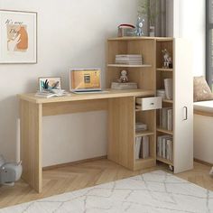 a wooden desk sitting in front of a window next to a book shelf filled with books