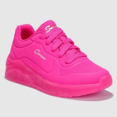 a woman's pink sneaker with white lettering on the side and neon pink soles