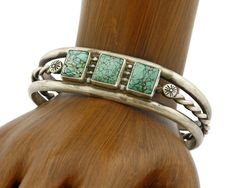 Metal Purity:.925 Sterling SilverStyle:CuffMain Stone:TurquoiseType of Stone:Natural Tibetan TurquoiseTribal Affiliation:NavajoBrand/Artisan:NavajoSigned/Unsigned:UnsignedTotal Gram Weight:32.3 gramsFits Wrist Size (inches):5.5 - 6.75Gap Width (inches):1.20Inside Side to Side Width (inches):2.35Inside Bracelet Including Gap (inches):6.25Top of Bracelet Width (inches):N/AMade in:USAThis Navajo cuff bracelet will make a great addition to your fine jewelry collection Silversmithing Jewelry, Turquoise Bracelets, Country Jewelry, Bear Claw, Navajo Bracelet, Tibetan Turquoise, Turquoise Bracelet Cuff, Turquoise Cuff, Feather Necklaces