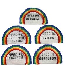 four embroidered patches with the words special neighbor and special friend in rainbows on them