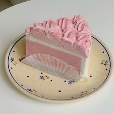 a piece of pink cake on a plate