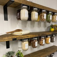 the shelves are filled with jars and spices