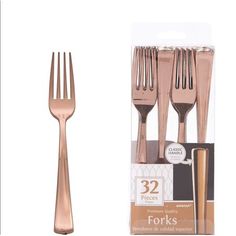 forks and spoons in packaging on white background