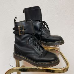 * Estimated best fit: Women's 8.5 | Men's 6 Measurements taken lying flat, not doubled, without overextending. TAG INFO:  Made in England Up for your consideration is this awesome, rare pair of original Made in England black leather Dr. Martens with a lace up 10 eye and a double buckle top closure. These boots have a 6 stamped on the inside of them, which originally I thought was a 9 but they are too snug for women's size 9 so I have came to the conclusion that the stamp is for a men's 6 and the Placerville California, Unanswered Questions, Buckle Top, Historic Downtown, Vintage Grunge, Shoe Boots, Black Leather, Bathing Beauties, England