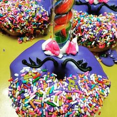 there are many donuts with sprinkles on them