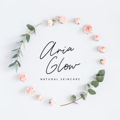 the logo for an organic skin care brand with pink roses and eucalyptus leaves around it