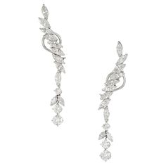 1950's Marquise and round diamond long dangle earrings in 14k white gold settings. 22 Marquise diamonds with two round dangles at the bottom. 2.40 inches long. 22 Marquise diamonds, approx. total weight 3.60cts, H – I, SI1 – I 1 6 round diamonds, approx. total weight 1.90cts, H, SI1 – SI2 14k white gold Tested and stamped: 14k 9.9 grams Top to bottom: 60.99mm or 2.40 inches Width: 9.11mm or .36 inch Depth: 2.98mm Dangle Diamond Earrings, Diamond Sapphire Engagement Ring, Antique Engagement Rings Vintage, Antique Bracelets, Vintage Sapphire, Diamond Engagement Rings Vintage, Diamond Dangle Earrings, Solid Gold Earrings, Long Dangle Earrings