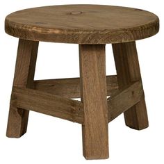 a small wooden stool with no legs on it's seat and one leg up