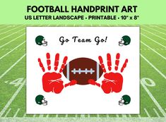 a football field with handprints on it and the words go team go written in red