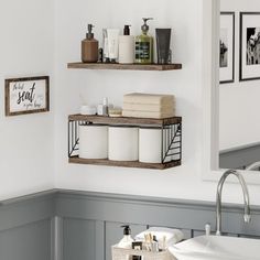 two shelves above a sink in a bathroom