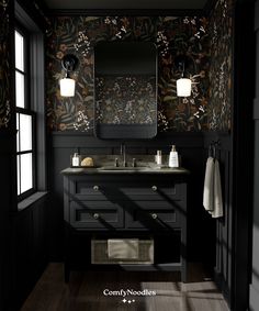 a bathroom with black walls and wood flooring is pictured in this image, there are two mirrors on the wall above the sink