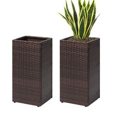 two brown planters sitting next to each other