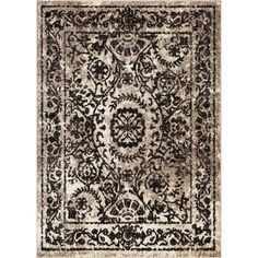 a black and white rug with an ornate design