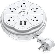 an electrical outlet with multiple plugs and wires attached to the cover, on a white background