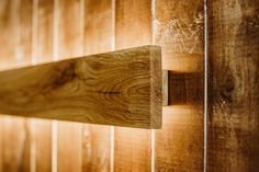 a wooden wall with some wood planks on it