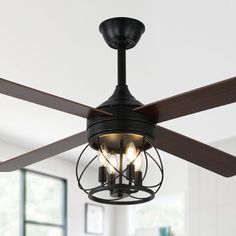 a ceiling fan with three lights in a room