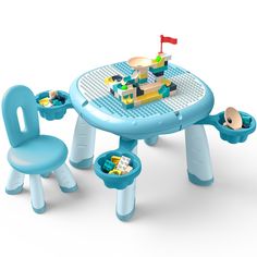 a blue table and chairs with legos on the top, in front of a white background